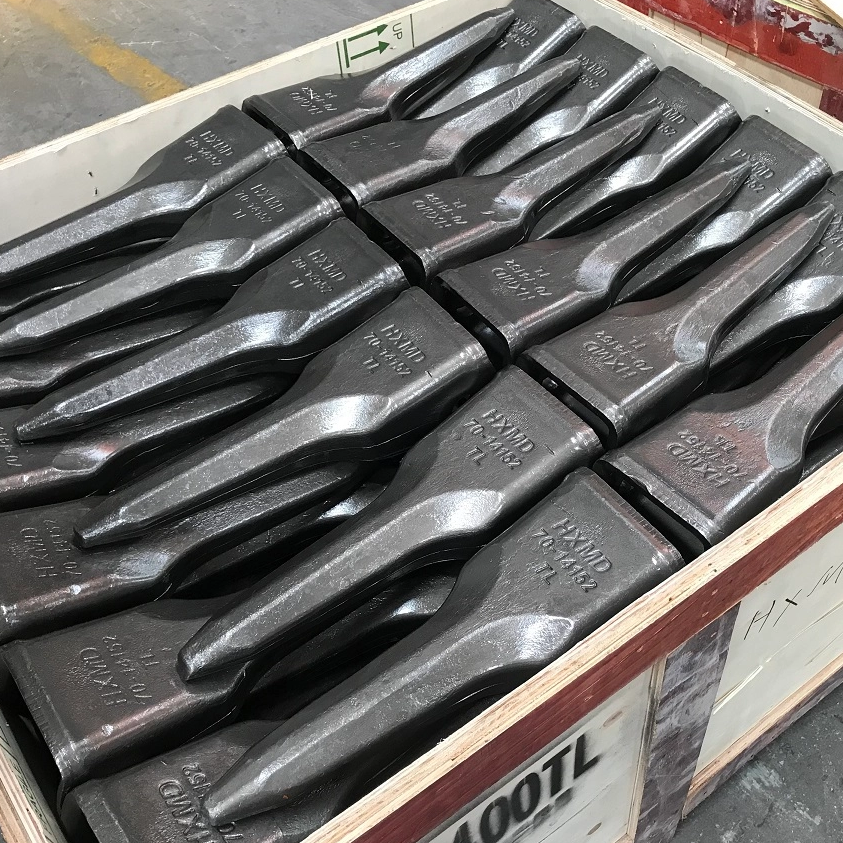 Quanto tempo dura o ciclo de substituição do dente da caçamba?